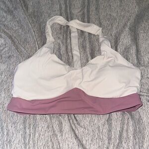 Medium burn primitive sports bra. White and light pink